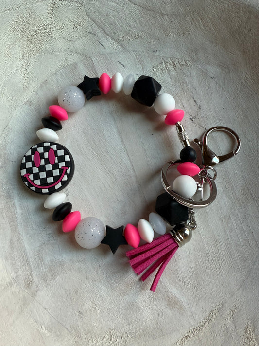Retro Smiley Checkered Face Wristlet - Black/Pink